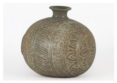 a rectangular round vase with inlaid patterns